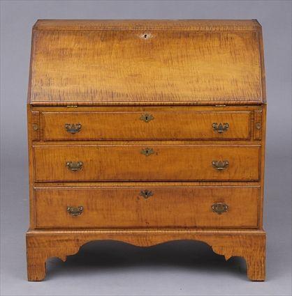 Appraisal: NEW ENGLAND CHIPPENDALE FIGURED MAPLE SLANT-FRONT DESK The hinged flap