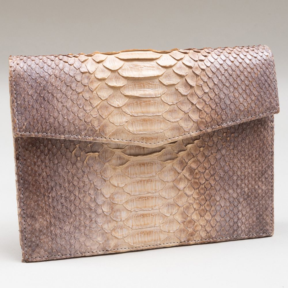 Appraisal: Ren Mancini Textured Leather Clutch With embossed gilt label x