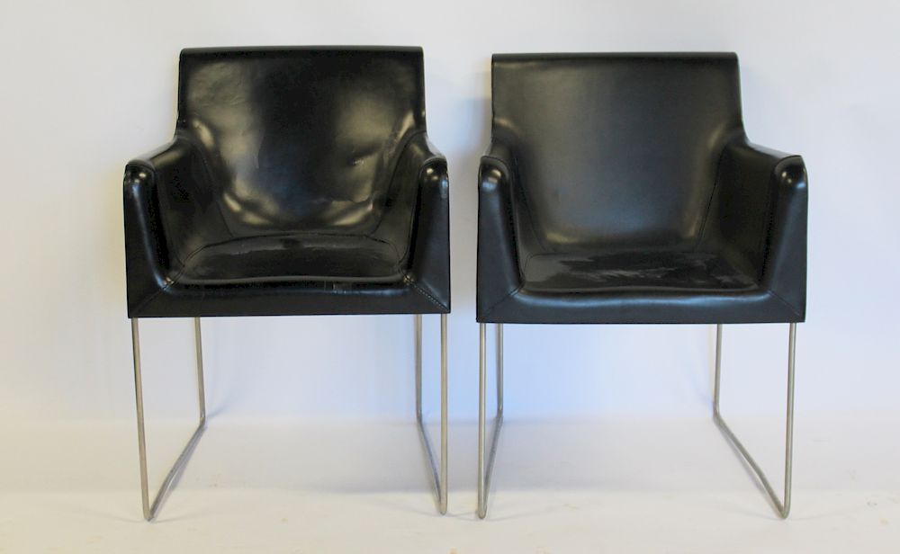 Appraisal: MIDCENTURY Pair Of Leather And Chrome Chairs Nice lines and