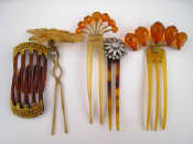 Appraisal: A pair of hair combs with damascene decoration together with