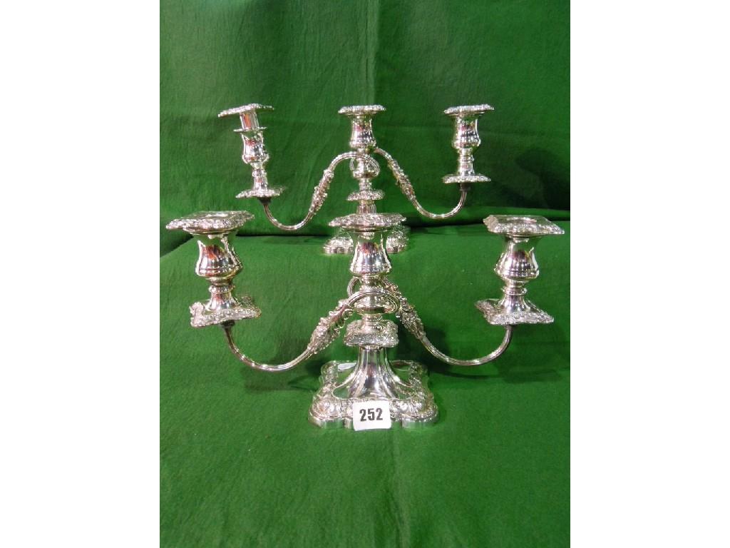 Appraisal: A pair of two branch silver plated candelabra of low