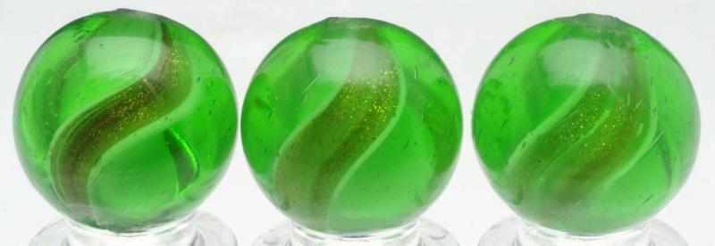 Appraisal: Lot of Green Glass Ribbon Lutz Marbles All with white