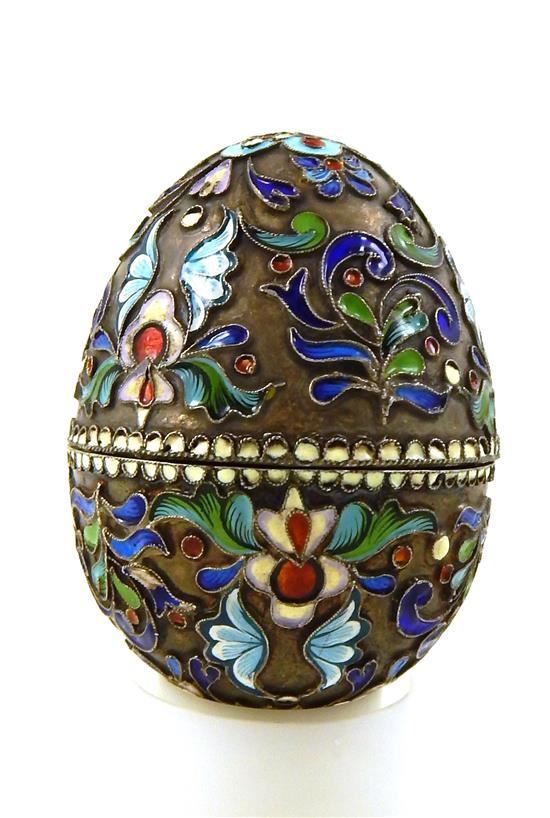 Appraisal: RUSSIAN SILVER Russian enameled egg polychrome floral design indistinctly marked