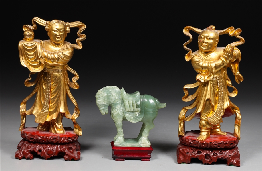 Appraisal: Pair of Chinese carved gilt wood figures atop bases with