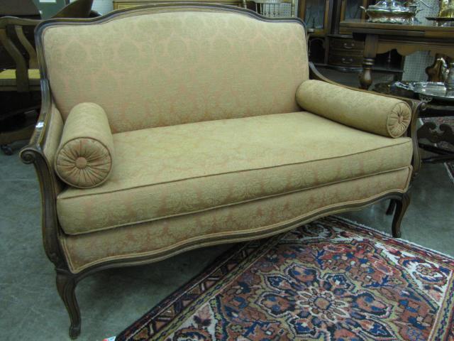 Appraisal: French Style Upholstered Loveseat with wood frame and carved diminutive