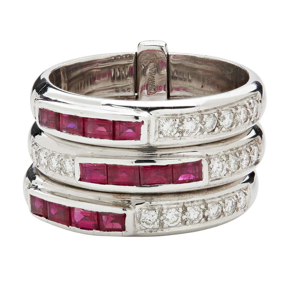 Appraisal: MOUAWAD - A modern ruby and diamond ring seteach band