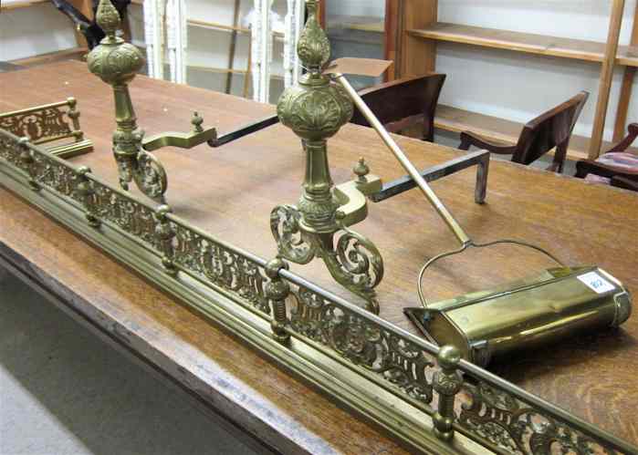 Appraisal: FOUR-PIECE BRASS HEARTH ACCESSORY GROUP fireplace fender pair of andirons