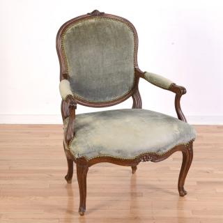 Appraisal: German rococo walnut armchair by Abraham Roentgen German rococo walnut