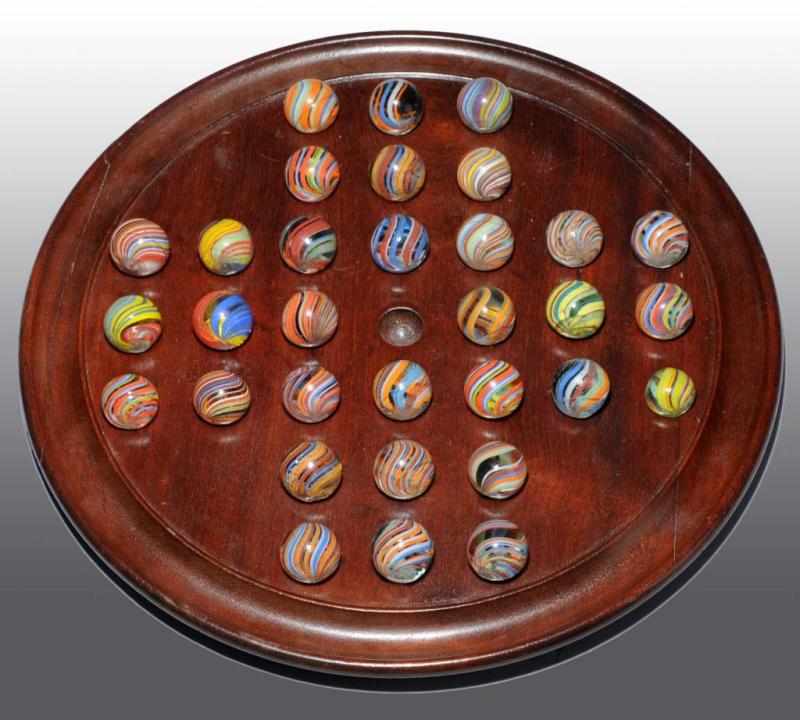 Appraisal: Solitaire Board Set Description Vintage board with Joseph Coat Marbles