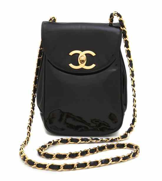 Appraisal: A Chanel Black Patent Leather Bag with chainlink strap logo