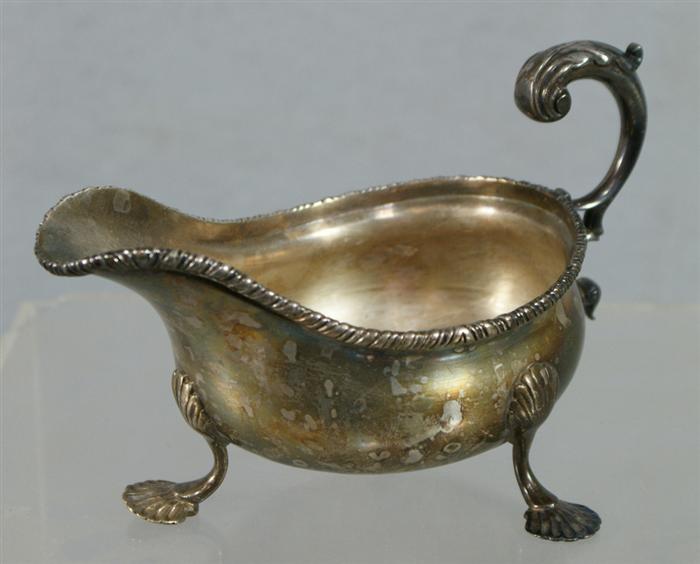 Appraisal: English sterling silver sauce boat with gadrooned edge London -