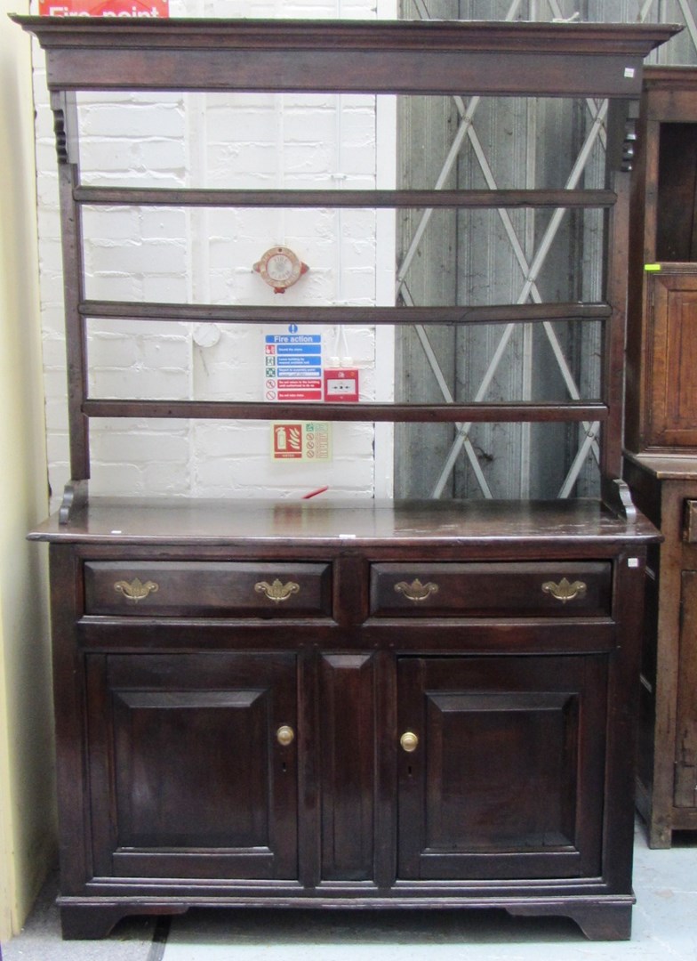 Appraisal: A th century oak dresser the open three tier plate