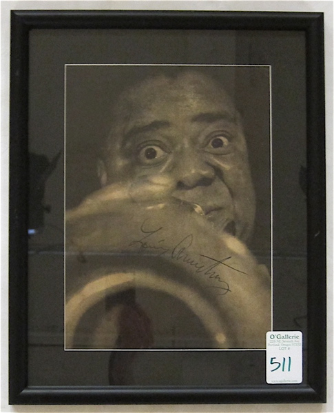 Appraisal: LOUIS ARMSTRONG AUTOGRAPHED PORTRAIT In a wood frame