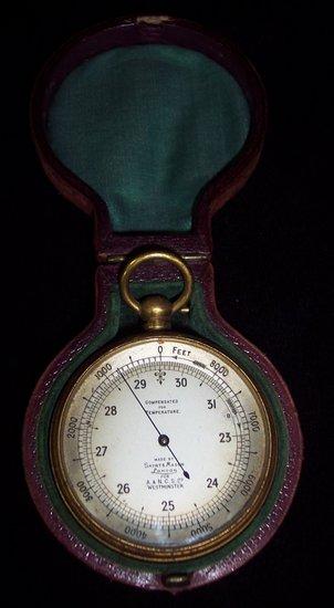 Appraisal: A pocket aneroid barometer and thermometer by Short Mason for