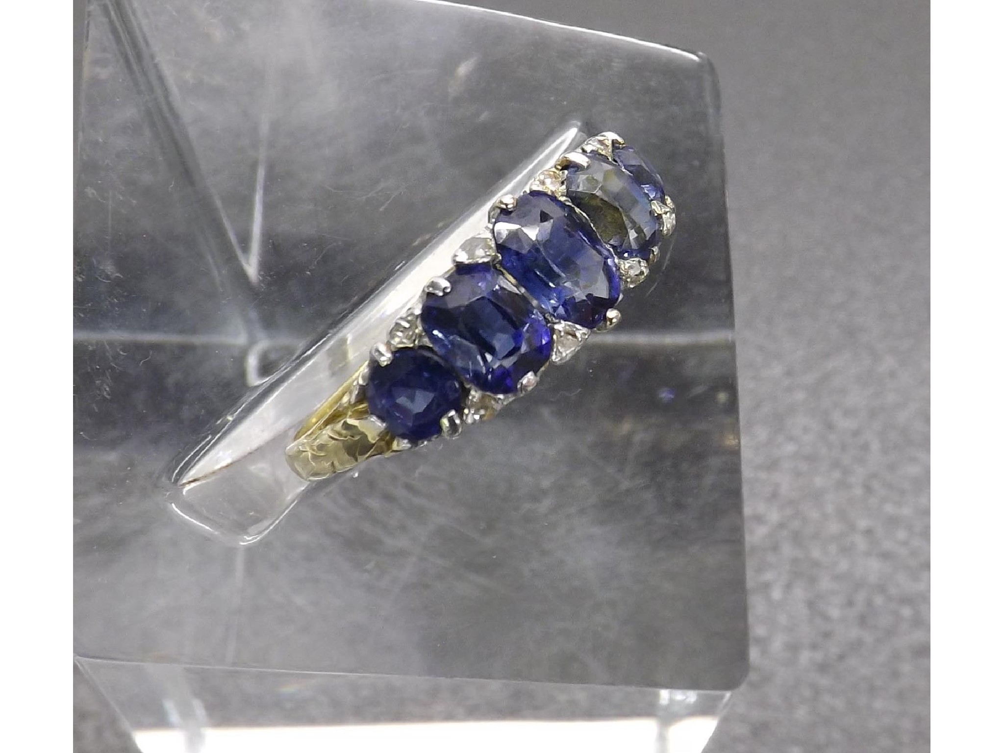 Appraisal: ct yellow gold sapphire and diamond claw set dress ring