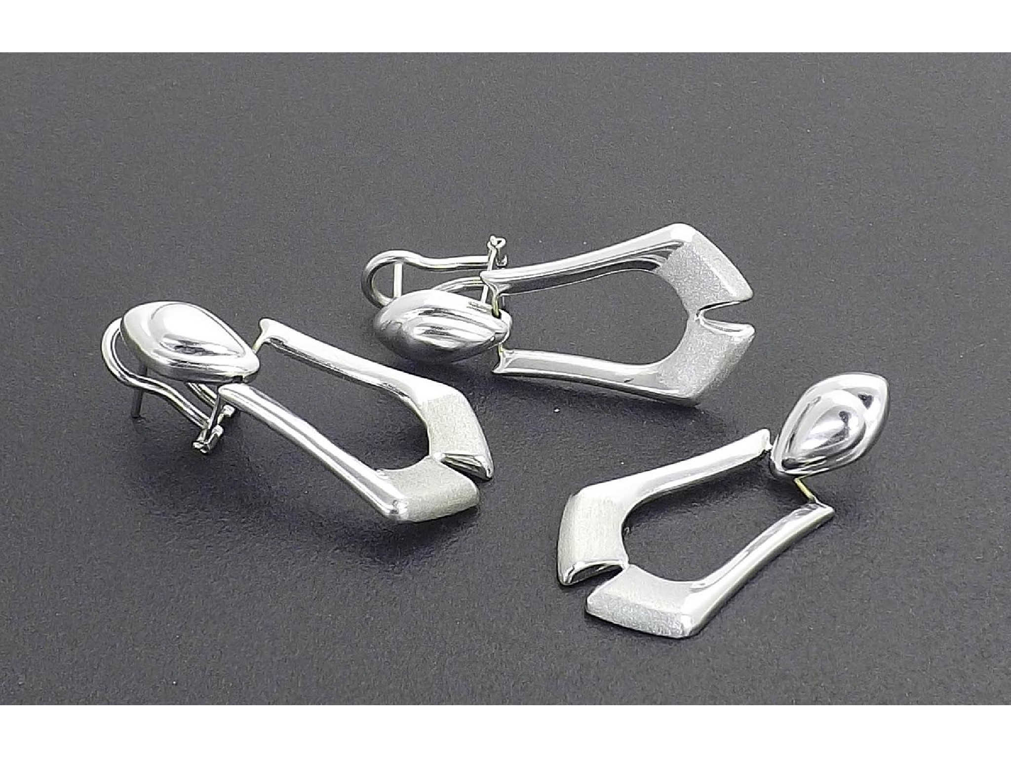 Appraisal: Pair of ct white gold modern drop earrings and a