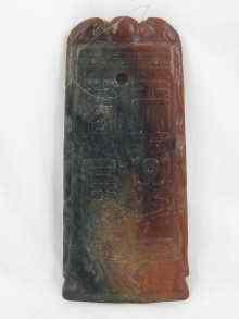 Appraisal: A Chinese jade tool possibly an axe head sharpened at