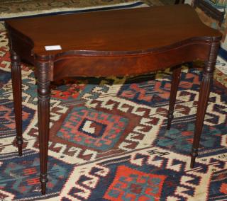 Appraisal: Sheraton Boston mahogany card table with serpentine front reeded leg