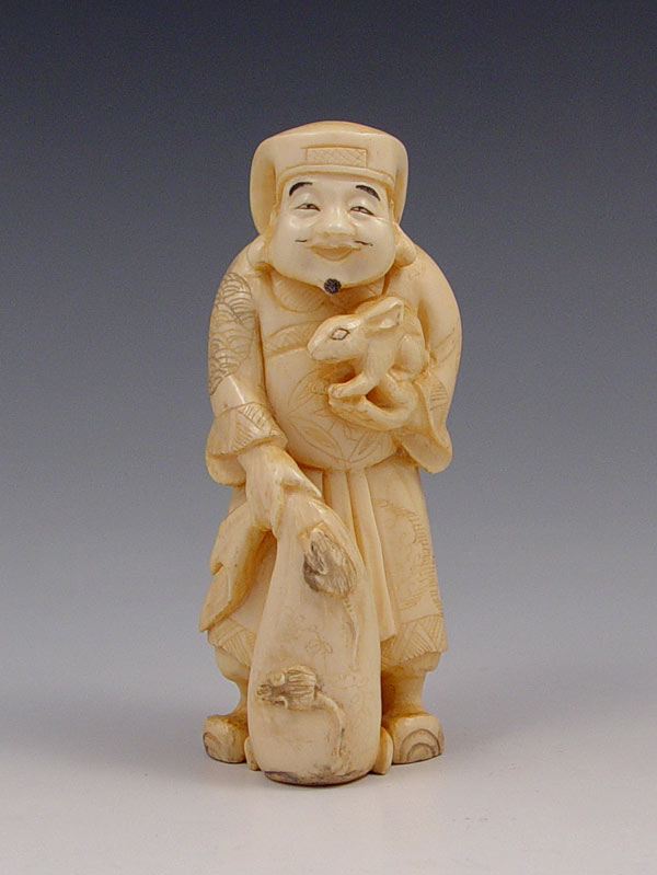 Appraisal: CHINESE CARVED IVORY FIGURE OF MAN WITH RABBIT Man with