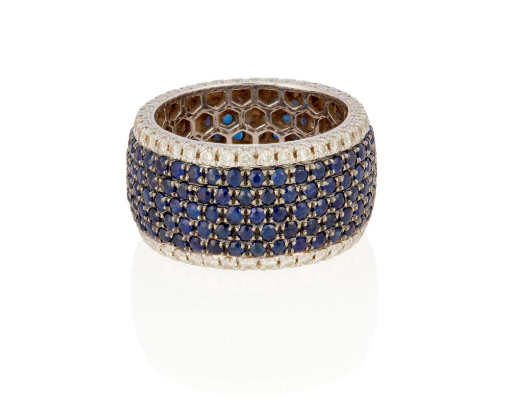 Appraisal: A SAPPHIRE AND DIAMOND BANDA sapphire and diamond band k