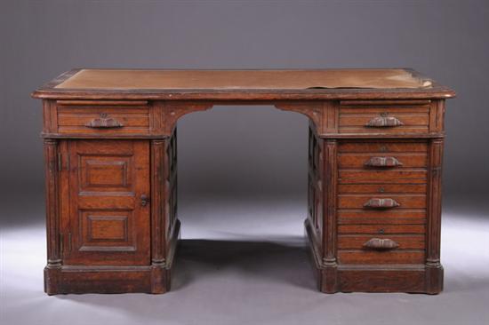 Appraisal: AMERICAN EASTLAKE OAK PANELLED DOUBLE-PEDESTAL DESK Branded Wollaeger Mfg Co