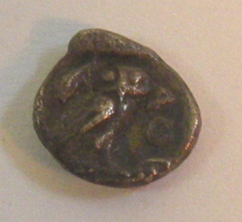 Appraisal: A struck silver coin possibly a Greek Obolus