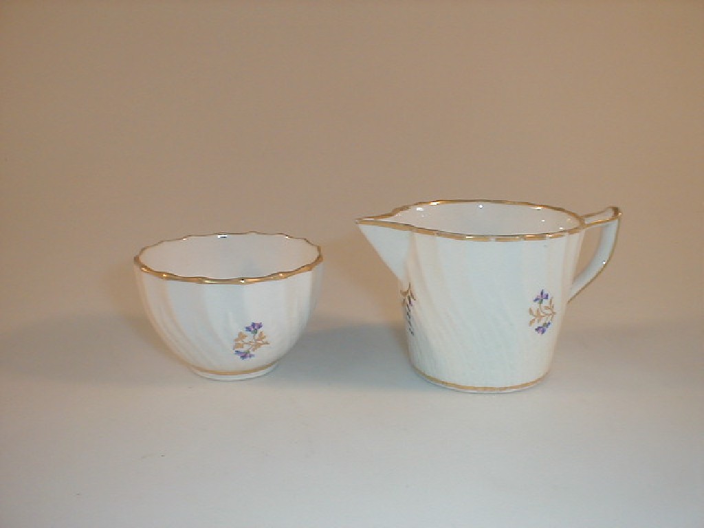 Appraisal: A Derby porcelain sparrow beak creamer and writhen tea bowl