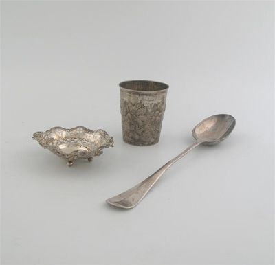 Appraisal: A mixed lot a decorative Dutch cast spoon with a