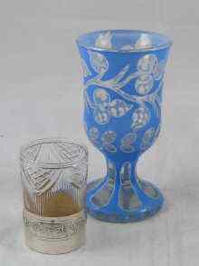 Appraisal: A French cut glass medicine glass with grade silver base