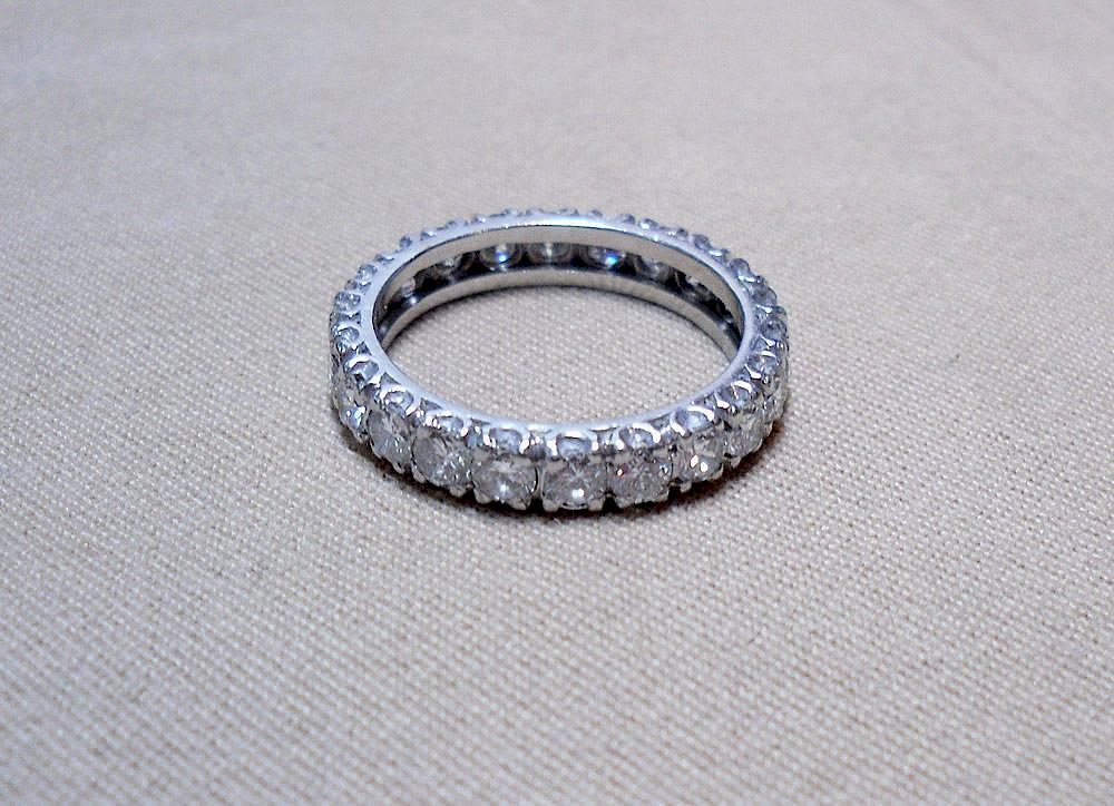 Appraisal: Diamond Eternity Band Platinum tested setting with round brilliant-cut diamonds