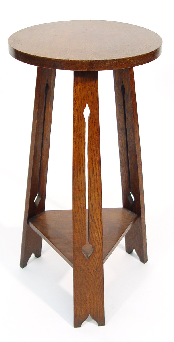 Appraisal: Arts and Crafts circular oak plant stand with triangular undertier