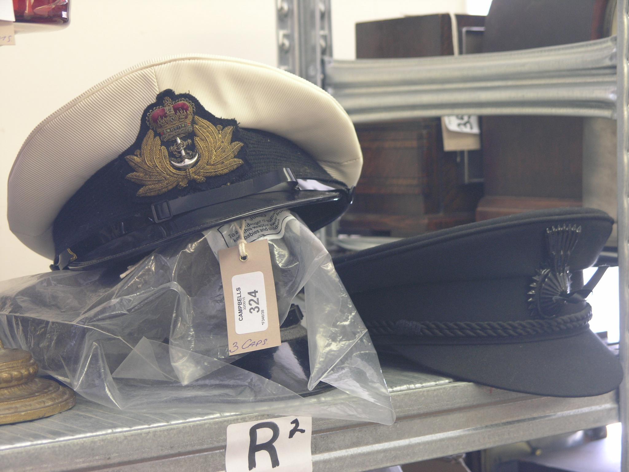 Appraisal: A naval officer's cap and two other caps