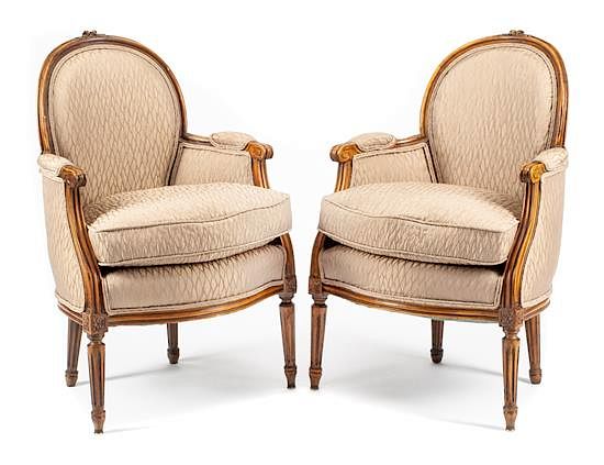 Appraisal: A Pair of Louis XVI Style Walnut Bergeres Height inches