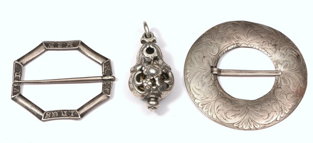 Appraisal: TWO SCOTTISH WHITE METAL BROOCHES together with a Jewish pendant