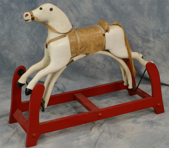 Appraisal: Carved and painted wood gliding horse English c long Estimate