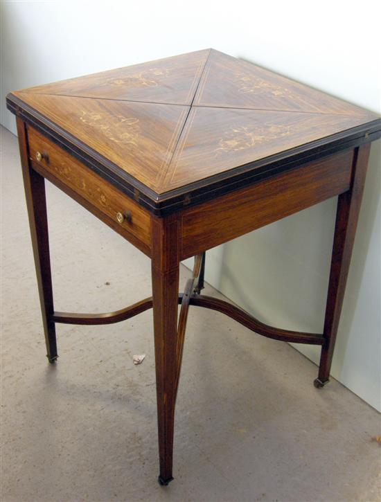 Appraisal: Early twentieth century rosewood and parquetry inlaid envelope card table