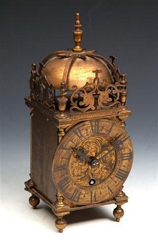 Appraisal: A TH CENTURY STYLE BRASS LANTERN CLOCK with striking mechanism