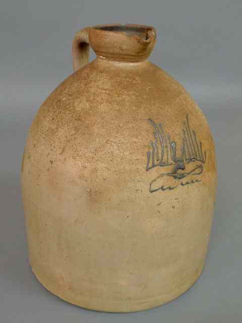 Appraisal: Two-gallon stoneware jug th c with blue decorated front h