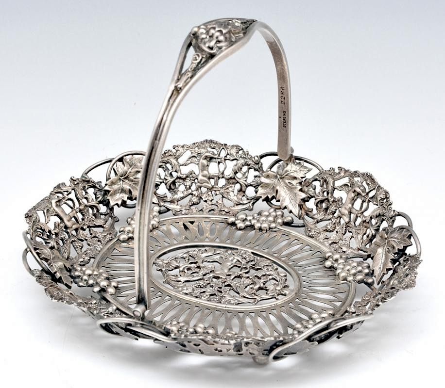 Appraisal: Theodore Starr sterling silver handled basket Theodore Starr sterling silver