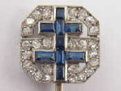 Appraisal: A French hallmarked carat white gold diamond and sapphire stick