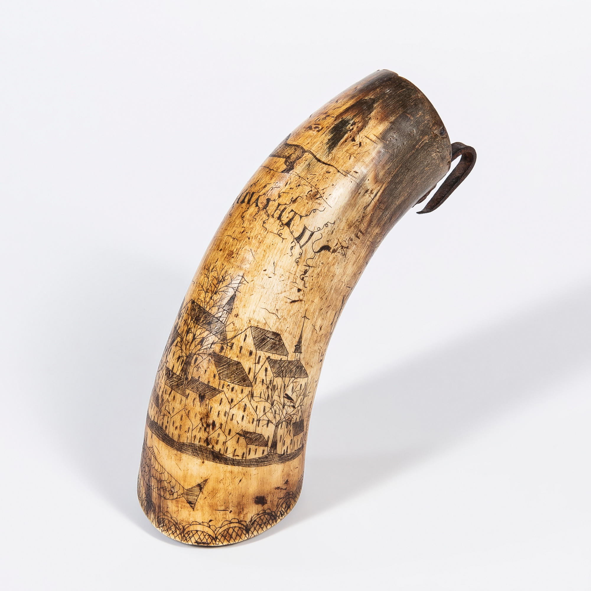 Appraisal: WHETSTONE HORN WITH MODERN CARVED DECORATION th th century the