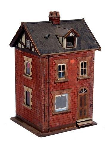 Appraisal: A VICTORIAN DOLLS HOUSE the frontage with front door and