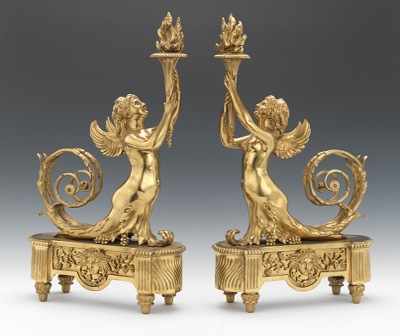 Appraisal: A Pair of Gilt Bronze Chenets Brightly polished and lacquered