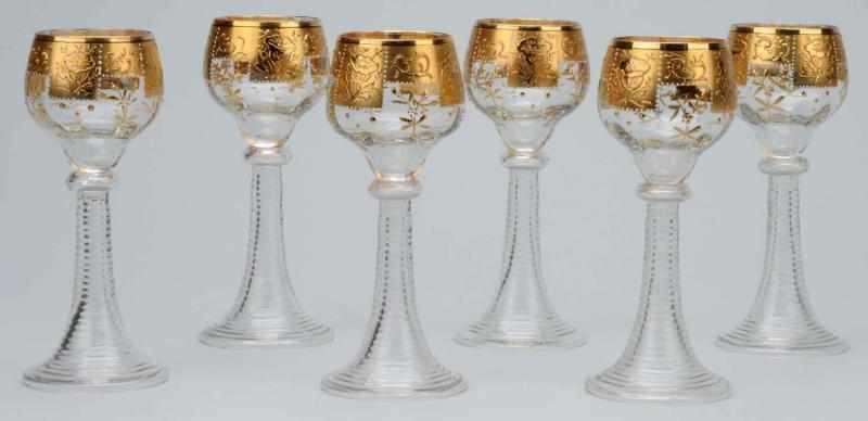 Appraisal: Set of Moser Goblets with Heaving Gilding Description With enameling