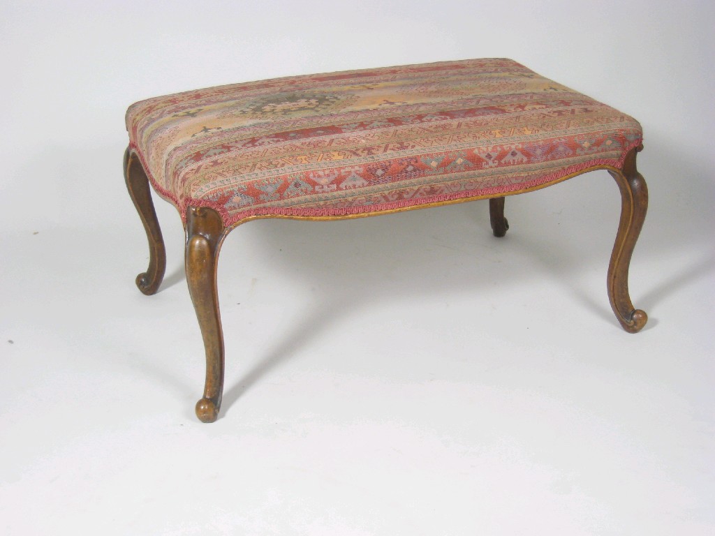 Appraisal: A th Century walnut Dressing Stool with upholstered seat on