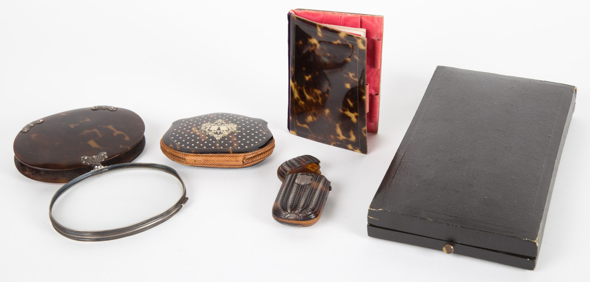 Appraisal: Four Victorian tortoiseshell items late th century includes folding magnifying