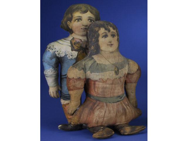 Appraisal: Pair of Printed Cloth Dolls America ca cloth dolls made