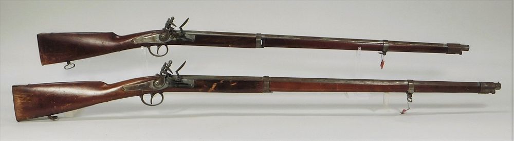 Appraisal: Two Decorative Belgian-made Muskets Belgium C s bore walnut stocks