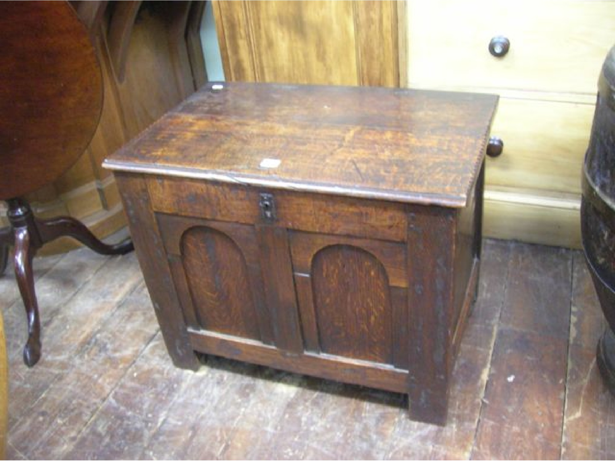 Appraisal: A small th century oak coffer with rising lid the