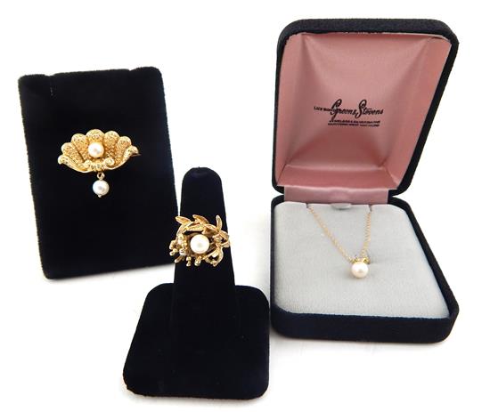 Appraisal: JEWELRY K yellow gold pearl suite three pieces shell design